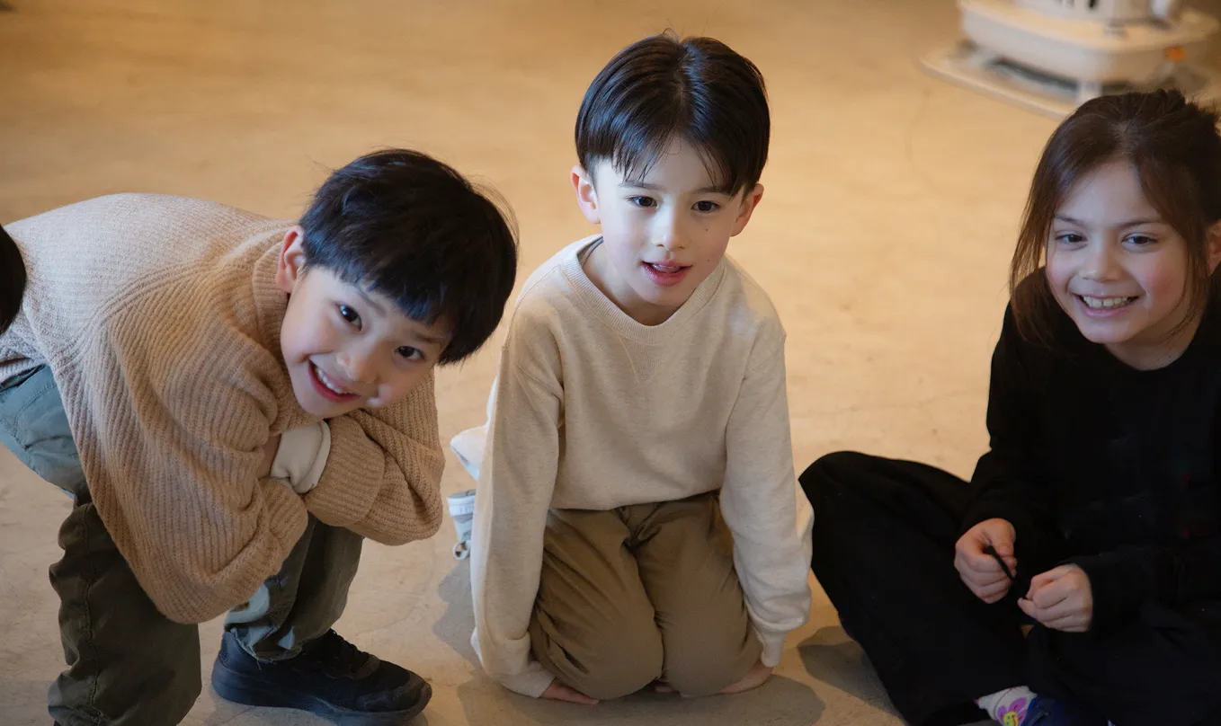 Children learning from their teacher